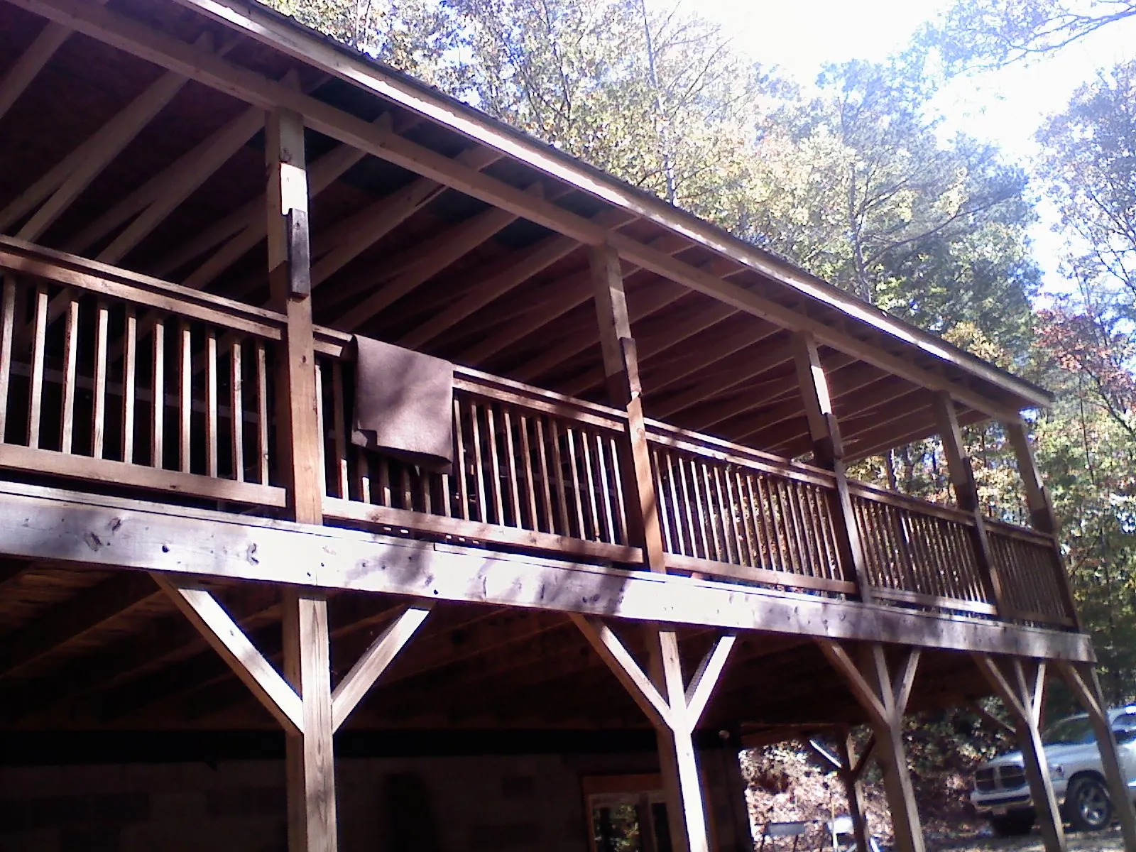 Timber framing under a new elevated porch and deck — Roof Leak Repair in Rushmore by Roofing Brothers